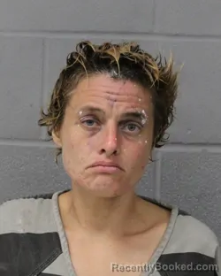 Mugshot of Heather Knuckles booked in Travis County, Texas on July 26, 2026