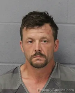 Mugshot of Drew Davis booked in Travis County, Texas on July 27, 2026