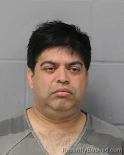 Mugshot of Prabhudev Upadhyay booked in Travis County, Texas on July 26, 2026