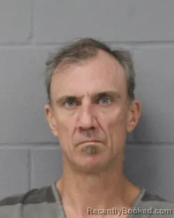 Mugshot of Jonathon Cuip booked in Travis County, Texas on July 27, 2026