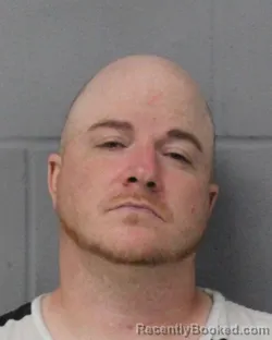 Mugshot of Andrew Butters booked in Travis County, Texas on July 27, 2026
