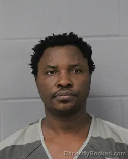 Mugshot of Bienvenu Nzenga booked in Travis County, Texas on July 27, 2026