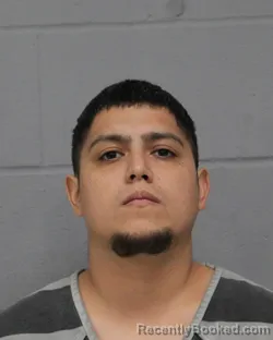 Mugshot of Adam Luna Jimenez booked in Travis County, Texas on July 27, 2026