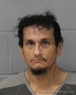 Mugshot of Eric Gallegos booked in Travis County, Texas on July 27, 2026