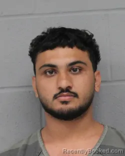 Mugshot of Jagde Grewal booked in Travis County, Texas on July 27, 2026