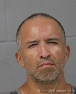 Mugshot of Hector Bernal booked in Travis County, Texas on August 4, 2026