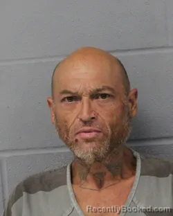 Mugshot of Joe Romo booked in Travis County, Texas on August 4, 2026