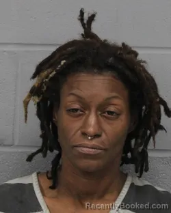 Mugshot of Sharon Simmons booked in Travis County, Texas on August 6, 2026
