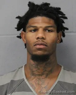 Booking photo from Travis County, Texas