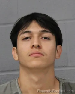 Mugshot of Rony Valencia booked in Travis County, Texas on August 10, 2026