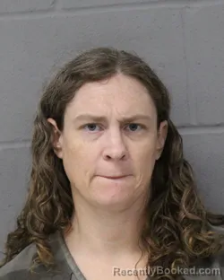 Mugshot of Alecia Oliver booked in Travis County, Texas on August 14, 2026