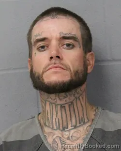 Mugshot of Caleb Wood booked in Travis County, Texas on August 24, 2026