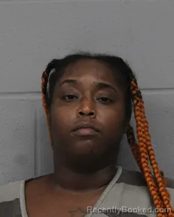 Mugshot of Omonique Overton booked in Travis County, Texas on August 24, 2026