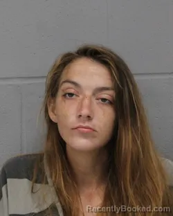 Mugshot of Ashley Cave booked in Travis County, Texas on August 24, 2026