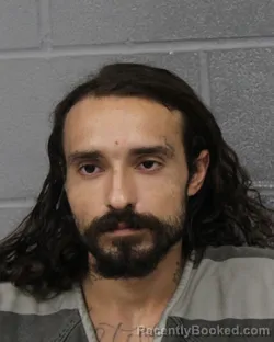Mugshot of Luis Santiago booked in Travis County, Texas on August 24, 2026