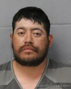 Mugshot of Alfonso Mendoza-Conchi booked in Travis County, Texas on September 24, 2026
