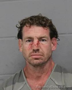 Mugshot of Russell Hardin booked in Travis County, Texas on September 28, 2026