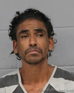 Mugshot of Omar Casarez booked in Travis County, Texas on October 1, 2026