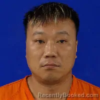 Mugshot of QI LI booked in Van Zandt County, Texas on June 16, 2026