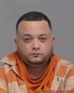 Mugshot of MIGUEL ENRIQUE RIVERA
