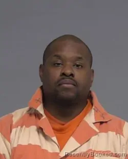 Mugshot of OJEANTI JOHN BELTOU booked in Nassau County, Florida on March 8, 2026