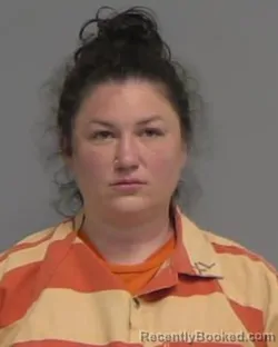 Mugshot of ASHLEY JO PERKINS booked in Nassau County, Florida on March 22, 2026