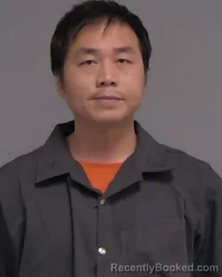 Mugshot of YANLONG HOU booked in Nassau County, Florida on March 23, 2026