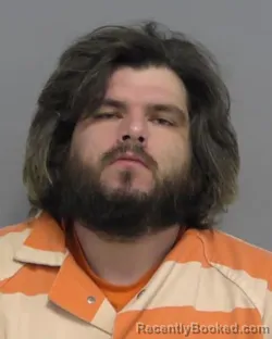 Mugshot of WILLIAM THOMAS HULS