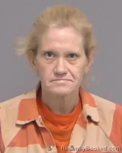 Mugshot of Crystal Lee Crews booked in Nassau County, Florida on October 8, 2026