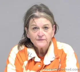 Mugshot of Angie Suzanne Smith booked in Nassau County, Florida on October 16, 2026