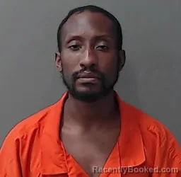 Mugshot of Alpha Christopher Mubita booked in Waller County, Texas on August 11, 2026