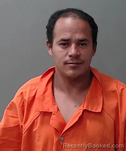 Mugshot of Beker Anthony Garcia Dominguez