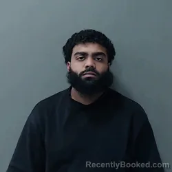 Mugshot of Muaaz Kasim Patel booked in Waller County, Texas on August 2, 2026