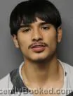 Mugshot of Ricardo Israel Flores booked in Washington County, Texas on August 8, 2026