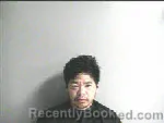 Mugshot of MIKE THAN LE booked in Wharton County, Texas on May 3, 2026
