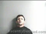 Mugshot of RAYLAN KAINE MELANCON