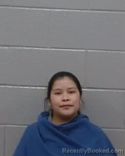 Mugshot of Lesbia Doris Manueles