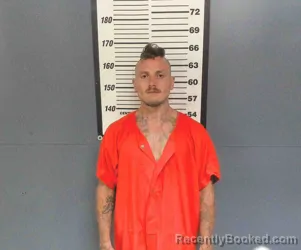 Mugshot of Dustin Taylor Lund booked in Willacy County, Texas on August 12, 2026