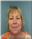 Mugshot of CAROLYN MILLER booked in Okaloosa County, Florida on April 14, 2026