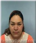 Mugshot of DIGNA LOPEZ SUAZO booked in Okaloosa County, Florida on April 21, 2026
