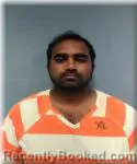 Mugshot of SHEIK KADHAR MYDEEN booked in Okaloosa County, Florida on June 25, 2026
