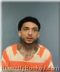 Mugshot of Curran Flores booked in Okaloosa County, Florida on August 4, 2026