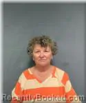 Mugshot of Peggy Hensel booked in Okaloosa County, Florida on August 6, 2026