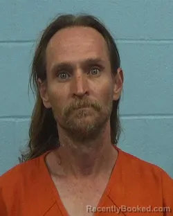 Mugshot of Travis James Huseman