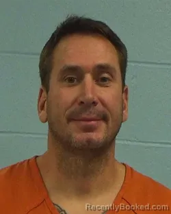 Mugshot of Aaron Joseph Hoes