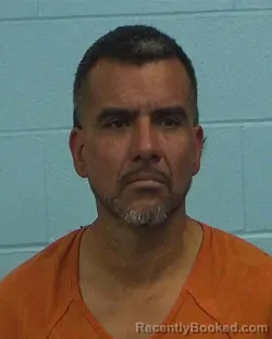 Mugshot of Leon Posada