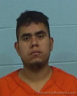 Mugshot of Juan Carlos Sostenes Benitez