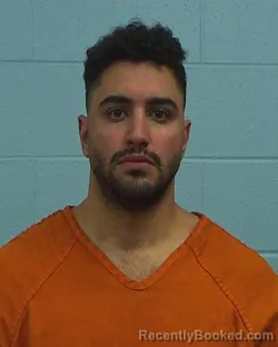 Mugshot of Tamam Takriti