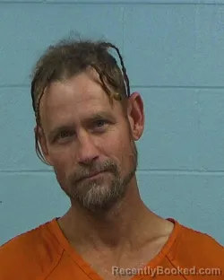 Mugshot of John Christopher Russell booked in Williamson County, Texas on March 11, 2026