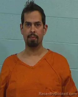 Mugshot of AARON DAVID KEMKARAN booked in Williamson County, Texas on March 13, 2026